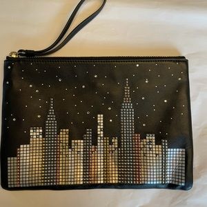 Kate Spade limited edition black leather and embellished wristlet.